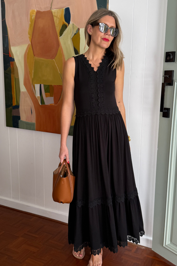 Black Evangeline Bamboo Dress with lace detail and flowing silhouette.