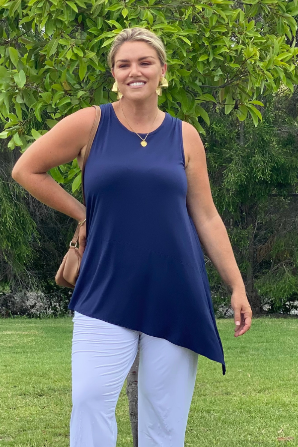 Model wearing Delia Bamboo Sleeveless Top in navy – front view