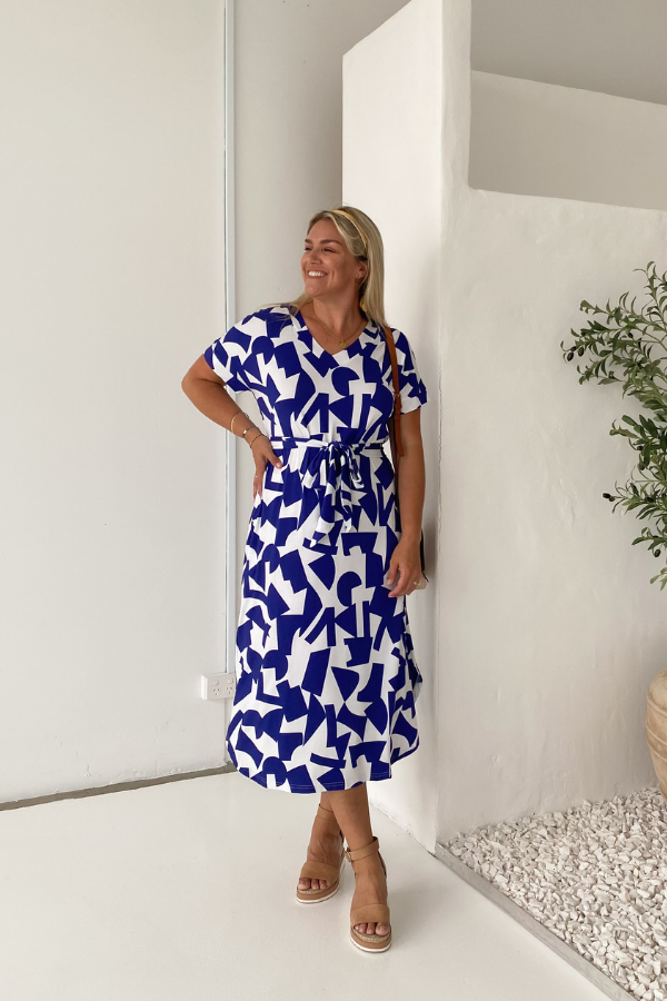 Bella Bamboo Tee Dress – breathable bamboo fabric, navy abstract print, crew neckline, curved hem