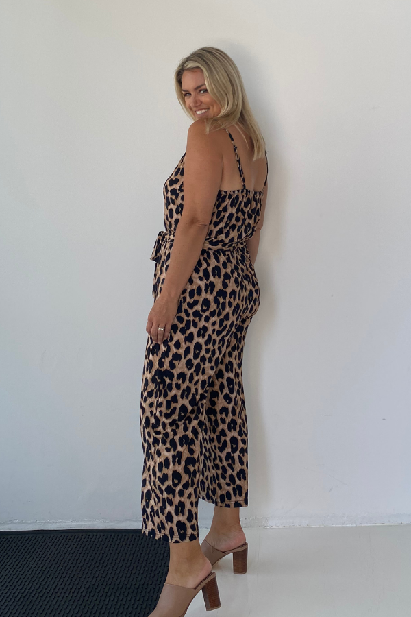 Side view of the Fay Bamboo Jumpsuit in Luxe Leopard showing the relaxed drape and 7/8 length cut.