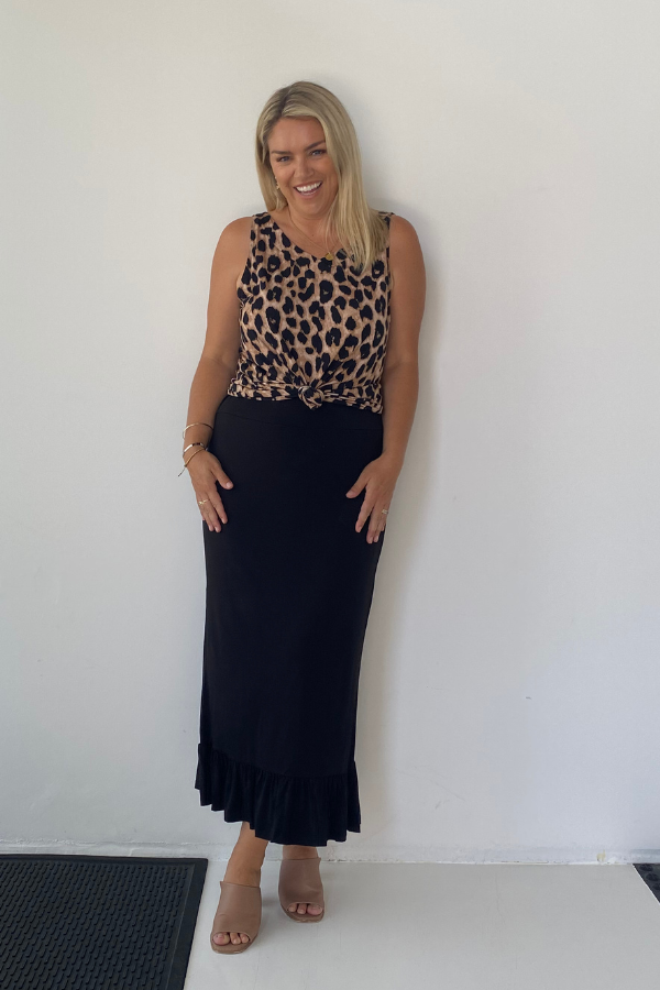 Luna Bamboo Sleeveless Top in Luxe Leopard paired with Phoebe Skirt in Black for a chic day-to-night outfit.