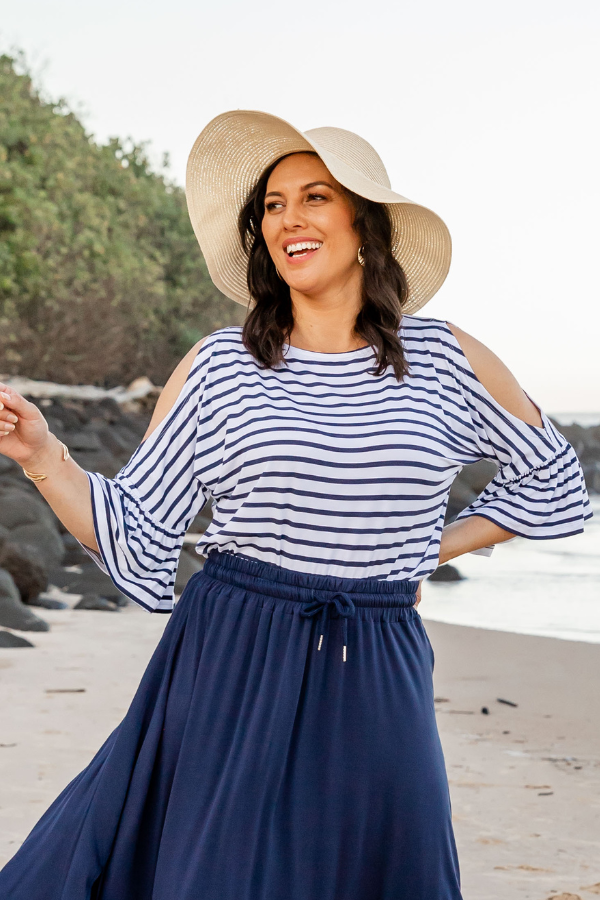 Natali The Label Navy Stripe Top—featuring soft bamboo fabric, classic navy and white stripes, relaxed fit, and round neckline for breathable, everyday elegance.