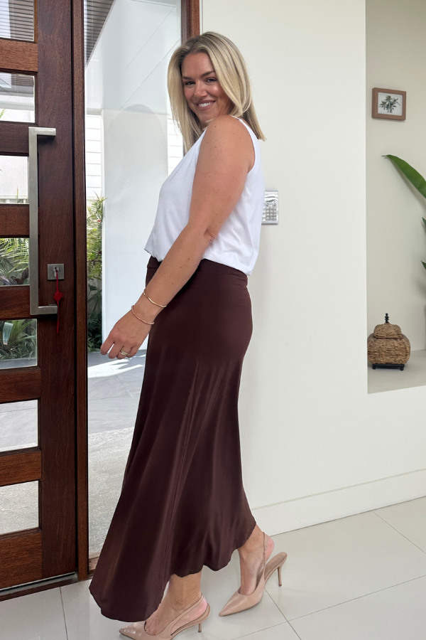 Side view of Raya Bamboo Skirt in Chocolate styled with Luna Bamboo Top in White