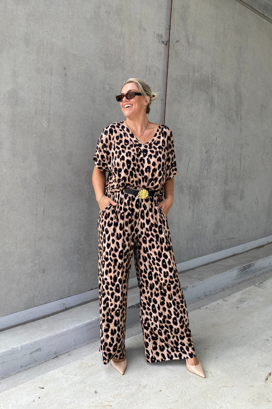 Model wearing Olivia Bamboo Top in Luxe Leopard with matching Alexa Pants for a bold set look.