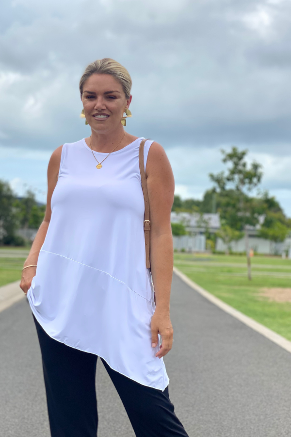 Model wearing Delia Bamboo Sleeveless Top in white – front view