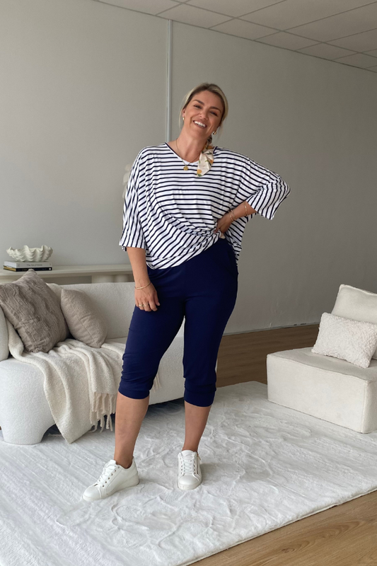 Model wearing Cora Bamboo 7/8 Slouch Jogger Pant in navy – front view